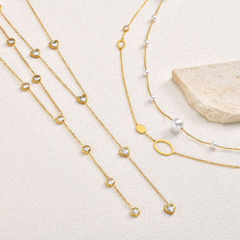 Gold Plated Sweater Necklace with Heart Charms