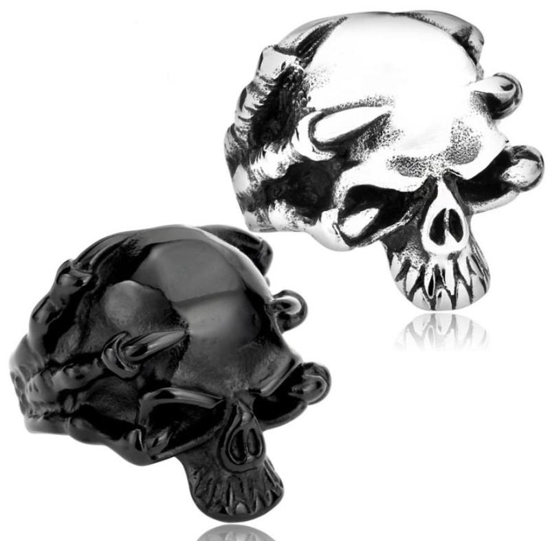 Wholesale Stainless Steel Hand Holding Skull Ring